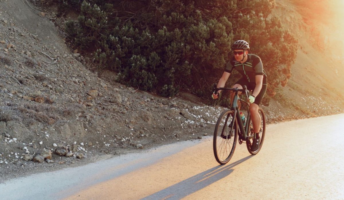 professional-cyclist-on-a-mountain-road-at-sunrise-2023-11-27-05-11-55-utc (1)